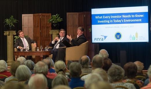 OIEA Director Lori Schock (center) and staff chat with Twitter followers about robo-advisers — the chat reached over 358,000 people and received nearly 6 million impressions.